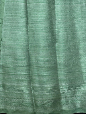 Woman wearing a Semi Silk Saree with a soft shine and lightweight drape, ideal for everyday elegance and traditional style.