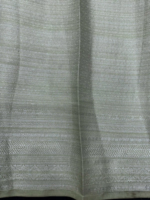 Woman wearing a Semi Silk Saree with a soft shine and lightweight drape, ideal for everyday elegance and traditional style.