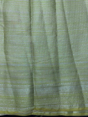 Woman wearing a Semi Silk Saree with a soft shine and lightweight drape, ideal for everyday elegance and traditional style.