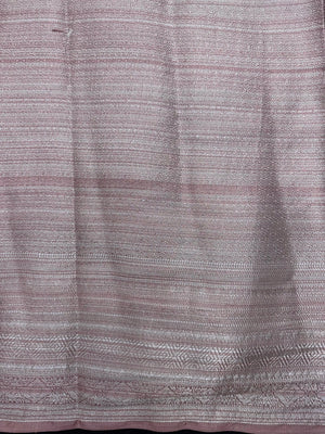 Woman wearing a Semi Silk Saree with a soft shine and lightweight drape, ideal for everyday elegance and traditional style.