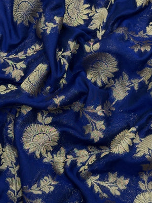 Woman wearing a Semi Chiffon Saree with lightweight, flowing fabric and subtle shine, perfect for weddings, parties, and office wear.