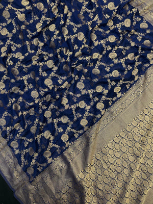 Woman wearing a Semi Chiffon Saree with lightweight, flowing fabric and subtle shine, perfect for weddings, parties, and office wear.