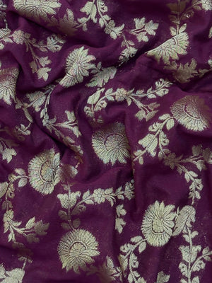 Woman wearing a Semi Chiffon Saree with lightweight, flowing fabric and subtle shine, perfect for weddings, parties, and office wear.