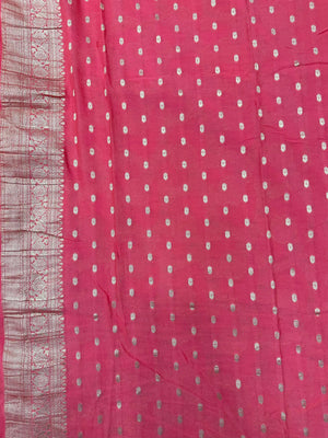 Woman wearing a Semi Chiffon Saree with lightweight, flowing fabric and subtle shine, perfect for weddings, parties, and office wear.