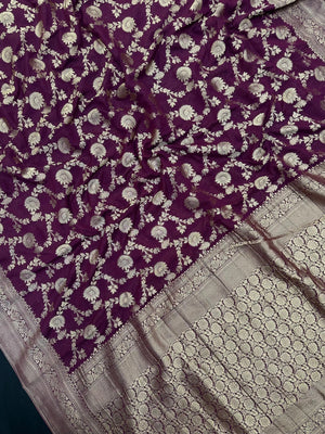 Woman wearing a Semi Chiffon Saree with lightweight, flowing fabric and subtle shine, perfect for weddings, parties, and office wear.