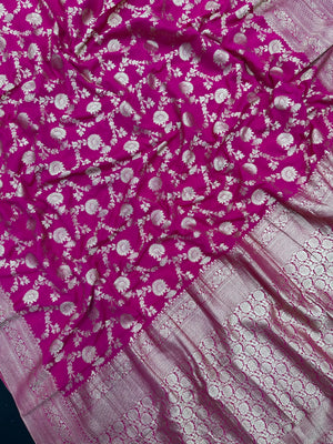 Woman wearing a Semi Chiffon Saree with lightweight, flowing fabric and subtle shine, perfect for weddings, parties, and office wear.