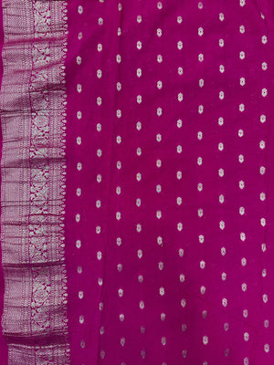 Woman wearing a Semi Chiffon Saree with lightweight, flowing fabric and subtle shine, perfect for weddings, parties, and office wear.