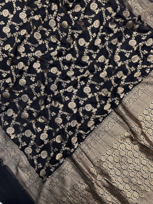 Woman wearing a Semi Chiffon Saree with lightweight, flowing fabric and subtle shine, perfect for weddings, parties, and office wear.