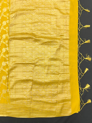 Woman wearing a Semi Chiffon Saree with lightweight, flowing fabric and subtle shine, perfect for weddings, parties, and office wear.