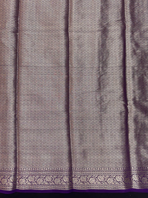 “Woman draped in a Semi Khaddi Georgette saree featuring intricate Banarasi motifs and a soft, flowy texture—perfect blend of tradition and lightness.”