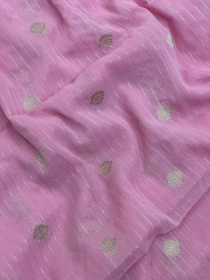 “Woman draped in a Semi Khaddi Georgette saree featuring intricate Banarasi motifs and a soft, flowy texture—perfect blend of tradition and lightness.”