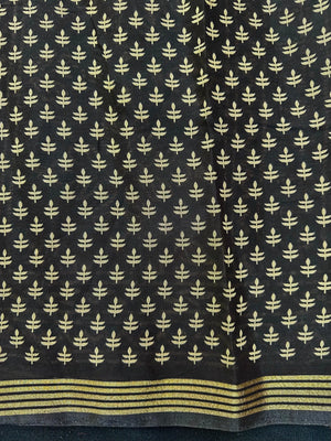 Woman wearing a Soft Tussar Silk Saree with subtle sheen and lightweight drape, perfect for daily wear and festive elegance.