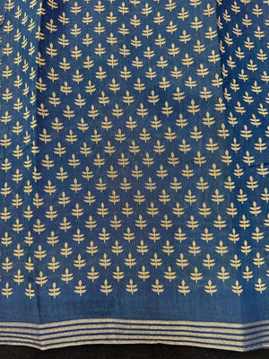 Woman wearing a Soft Tussar Silk Saree with subtle sheen and lightweight drape, perfect for daily wear and festive elegance.