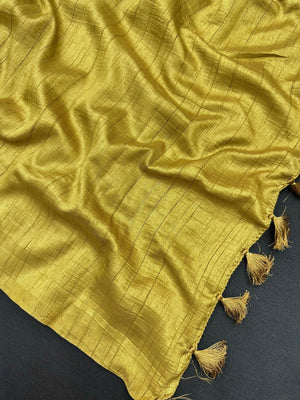 Woman draped in a Soft Tussar Silk Saree with subtle shine and fluid texture, ideal for elegant everyday and festive occasions.