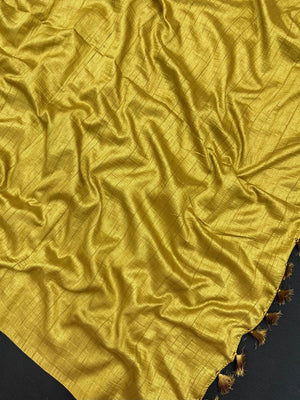 Woman draped in a Soft Tussar Silk Saree with subtle shine and fluid texture, ideal for elegant everyday and festive occasions.