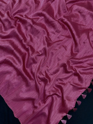 Woman draped in a Soft Tussar Silk Saree with subtle shine and fluid texture, ideal for elegant everyday and festive occasions.