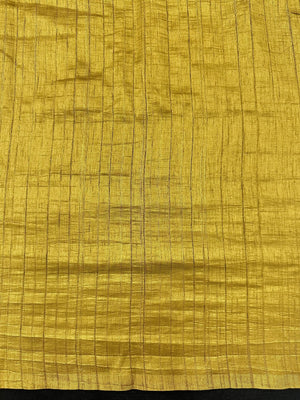 Woman draped in a Soft Tussar Silk Saree with subtle shine and fluid texture, ideal for elegant everyday and festive occasions.