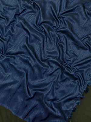 Woman draped in a Soft Tussar Silk Saree with subtle shine and fluid texture, ideal for elegant everyday and festive occasions.