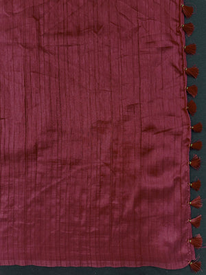 Woman draped in a Soft Tussar Silk Saree with subtle shine and fluid texture, ideal for elegant everyday and festive occasions.