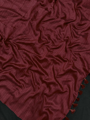 Woman draped in a Soft Tussar Silk Saree with subtle shine and fluid texture, ideal for elegant everyday and festive occasions.