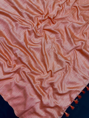 Woman draped in a Soft Tussar Silk Saree with subtle shine and fluid texture, ideal for elegant everyday and festive occasions.