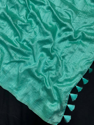 Woman draped in a Soft Tussar Silk Saree with subtle shine and fluid texture, ideal for elegant everyday and festive occasions.