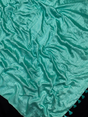 Woman draped in a Soft Tussar Silk Saree with subtle shine and fluid texture, ideal for elegant everyday and festive occasions.