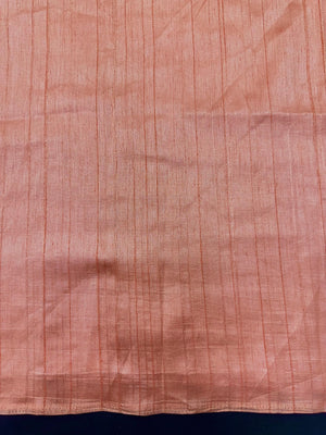 Woman draped in a Soft Tussar Silk Saree with subtle shine and fluid texture, ideal for elegant everyday and festive occasions.