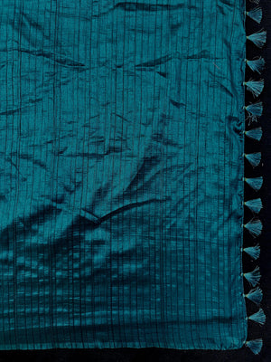 Woman draped in a Soft Tussar Silk Saree with subtle shine and fluid texture, ideal for elegant everyday and festive occasions.