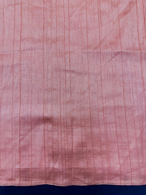 Woman draped in a Soft Tussar Silk Saree with subtle shine and fluid texture, ideal for elegant everyday and festive occasions.