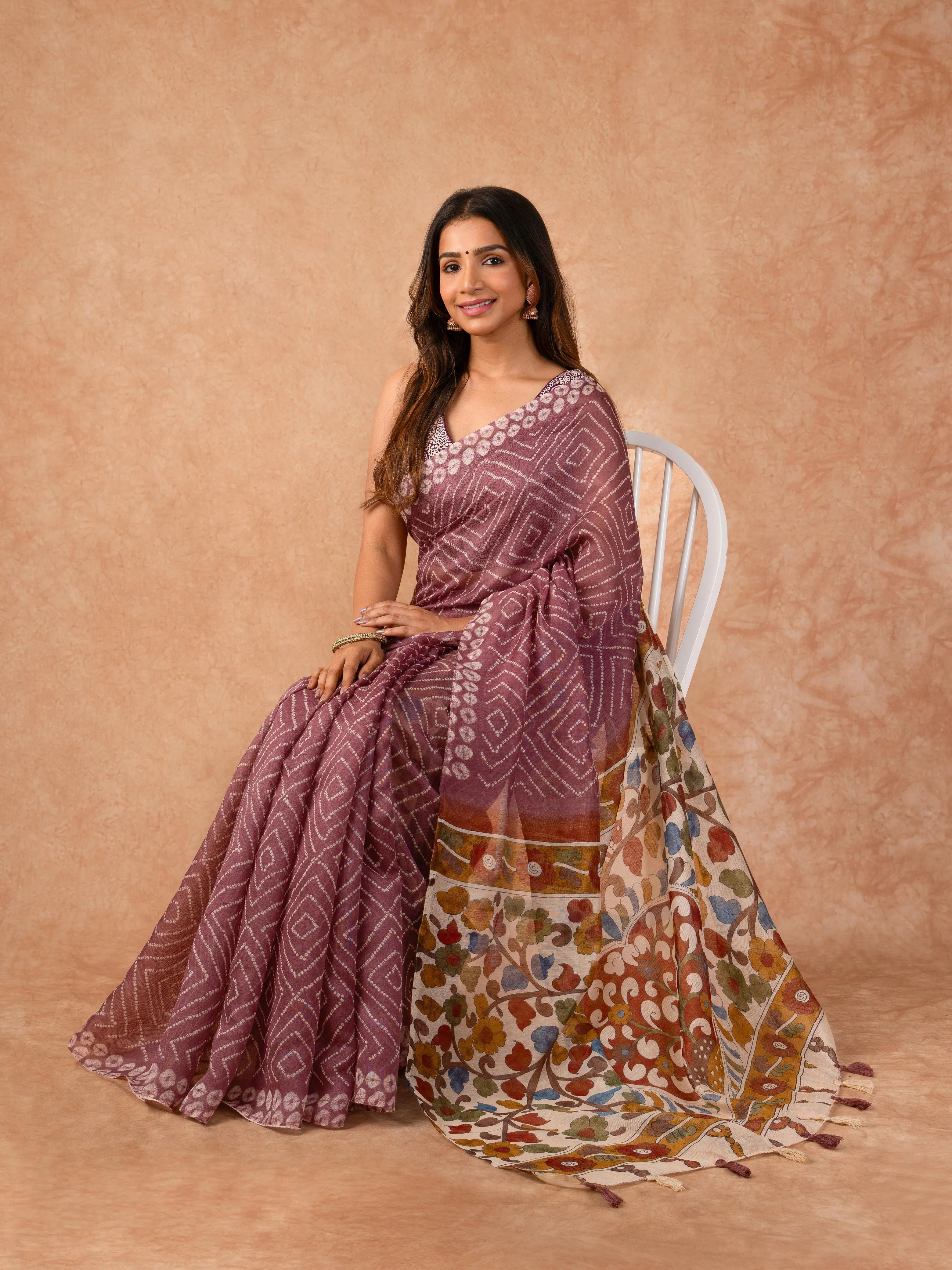 Woman wearing a Summer Loom Cotton Saree with lightweight, breathable fabric and subtle design, ideal for office and daily ethnic wear.