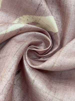 “Woman wearing a lightweight Tussar silk saree in earthy tones, featuring a soft natural sheen and subtle patterns—ideal for elegant daily wear.”