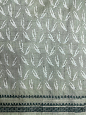 “Woman wearing a lightweight Tussar silk saree in earthy tones, featuring a soft natural sheen and subtle patterns—ideal for elegant daily wear.”