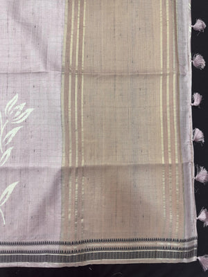 “Woman wearing a lightweight Tussar silk saree in earthy tones, featuring a soft natural sheen and subtle patterns—ideal for elegant daily wear.”