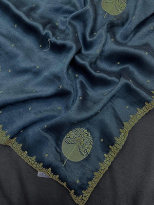 Woman draped in a Tussar Silk Saree with golden sheen and textured finish, ideal for ethnic events, poojas, and cultural functions.