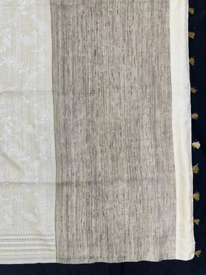 Tussar silk saree with raw silk texture and natural golden glow – handcrafted for elegant festive wear