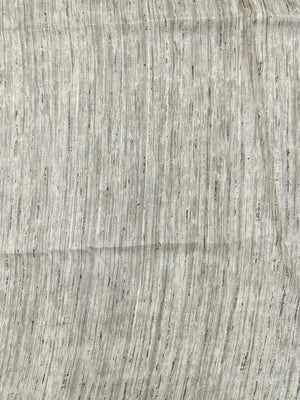 Tussar silk saree with raw silk texture and natural golden glow – handcrafted for elegant festive wear