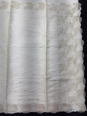 “Elegant woman wearing a graceful Tussar silk saree with a soft sheen, fine texture, and minimalistic patterns—ideal for regular wear with a touch of timeless sophistication.”