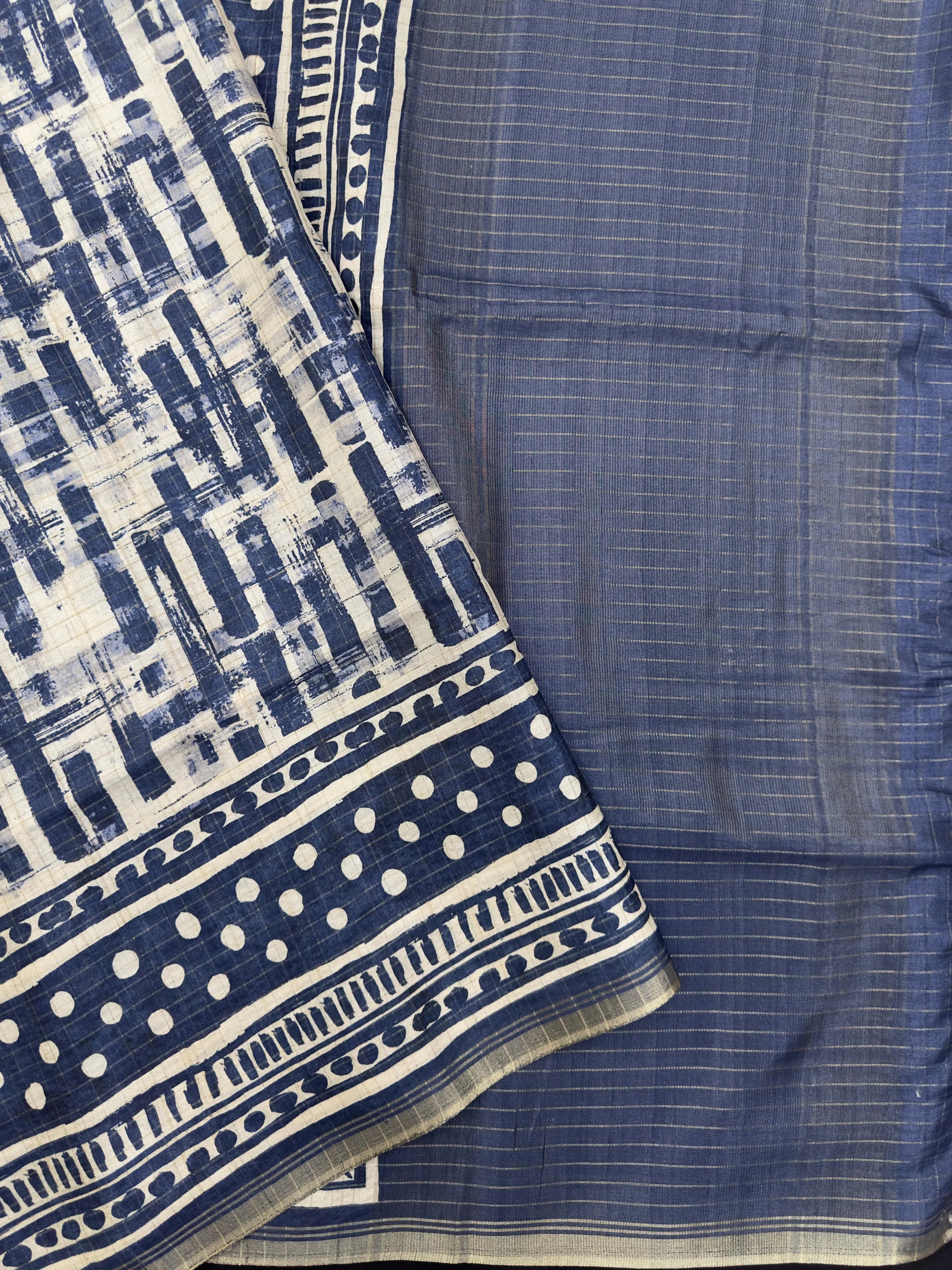 "Luxurious Tussar silk saree with a rich, textured finish, offering timeless elegance and comfort for regular wear."