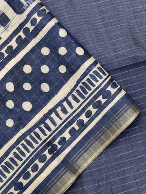 "Luxurious Tussar silk saree with a rich, textured finish, offering timeless elegance and comfort for regular wear."