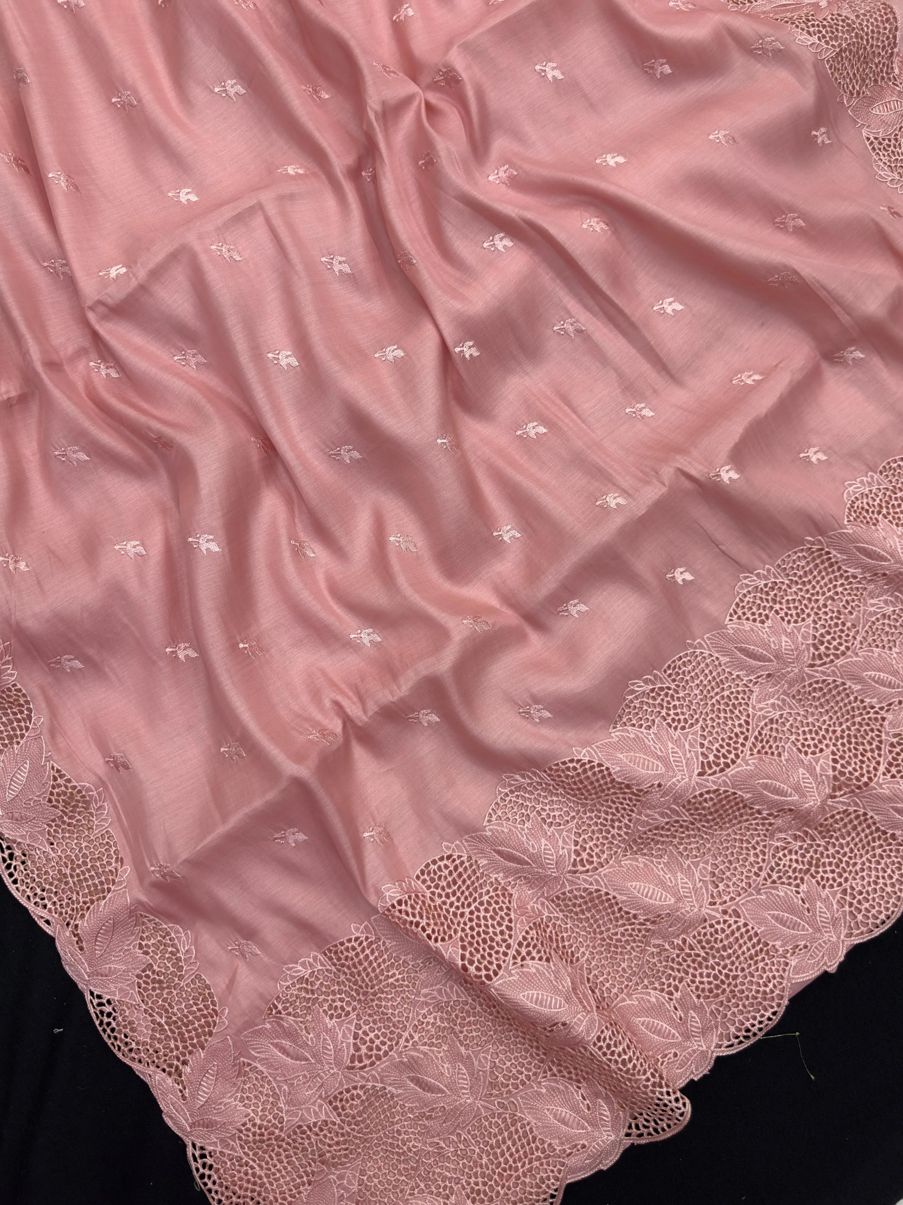 “Elegant woman wearing a graceful Tussar silk saree with a soft sheen, fine texture, and minimalistic patterns—ideal for regular wear with a touch of timeless sophistication.”