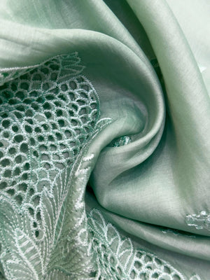 “Elegant woman wearing a graceful Tussar silk saree with a soft sheen, fine texture, and minimalistic patterns—ideal for regular wear with a touch of timeless sophistication.”