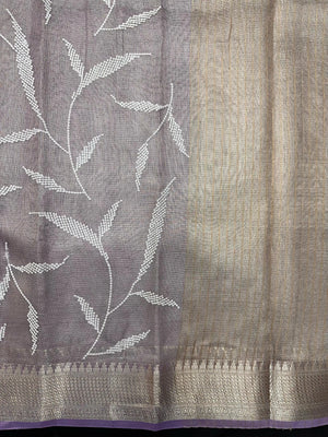 Woman wearing a Tussar Silk Saree with natural texture and subtle sheen, ideal for weddings, festivals, and cultural events.