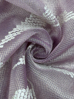 Woman wearing a Tussar Silk Saree with natural texture and subtle sheen, ideal for weddings, festivals, and cultural events.