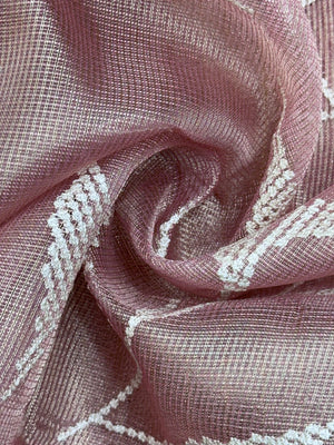 Woman wearing a Tussar Silk Saree with natural texture and subtle sheen, ideal for weddings, festivals, and cultural events.