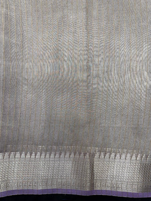 Woman wearing a Tussar Silk Saree with natural texture and subtle sheen, ideal for weddings, festivals, and cultural events.