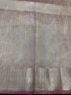 Woman wearing a Tussar Silk Saree with natural texture and subtle sheen, ideal for weddings, festivals, and cultural events.