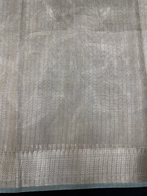 Woman wearing a Tussar Silk Saree with natural texture and subtle sheen, ideal for weddings, festivals, and cultural events.