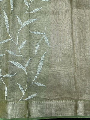 Woman wearing a Tussar Silk Saree with natural texture and subtle sheen, ideal for weddings, festivals, and cultural events.