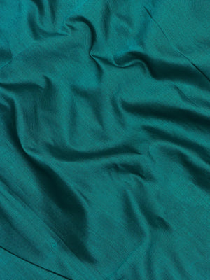 Woman wearing an Uppada Cotton Silk Saree with lightweight, breathable drape and subtle sheen, ideal for office and festive occasions.